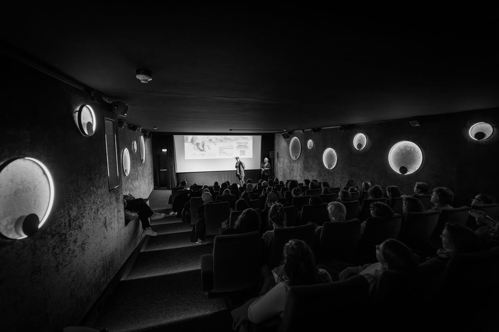 A full cinema during a screening and talk